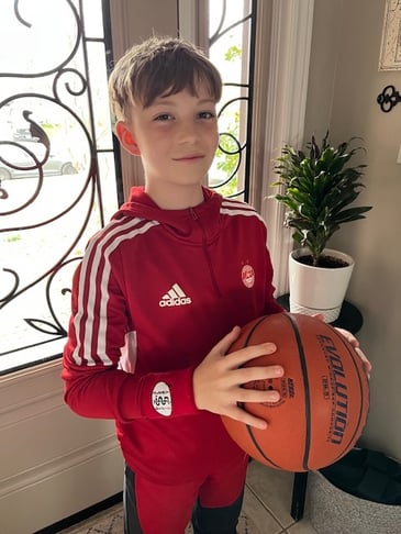 Luka wearing his MedicAlert Sports wrist band