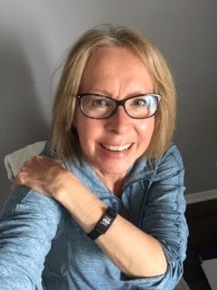 Ann showing off her MedicAlert ID