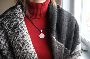 a necklace on red background