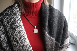 a necklace on red background