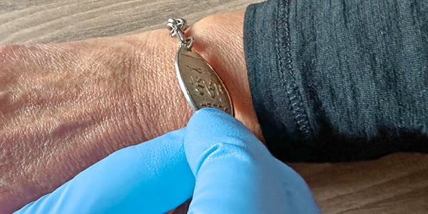 Medicalert ID checked in emergency scene