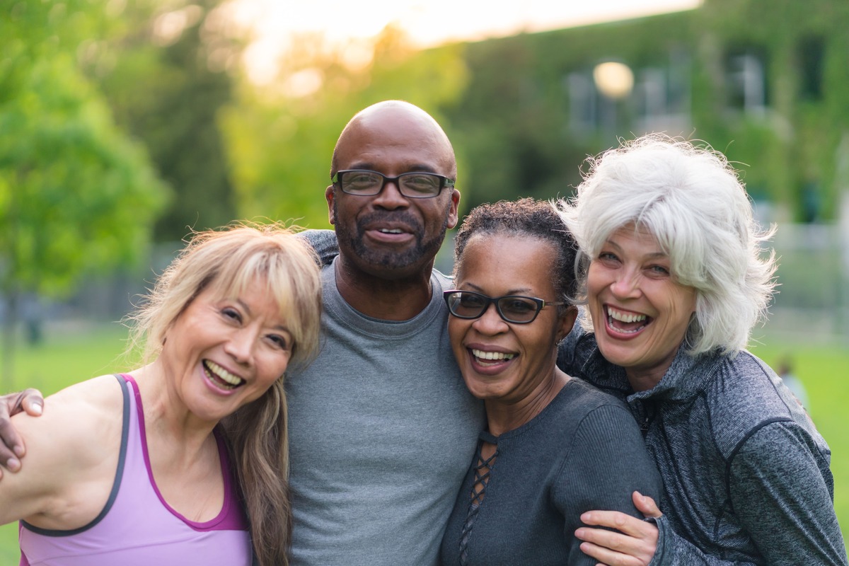 a diverse group of four people