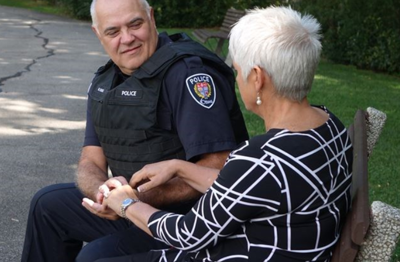 first responder with an elderly lady